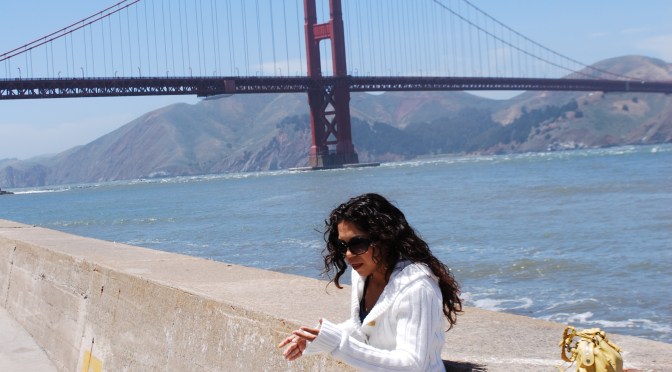 standing in front of golden gate bridge